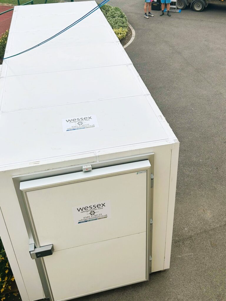 Modular freezer with pallet width door